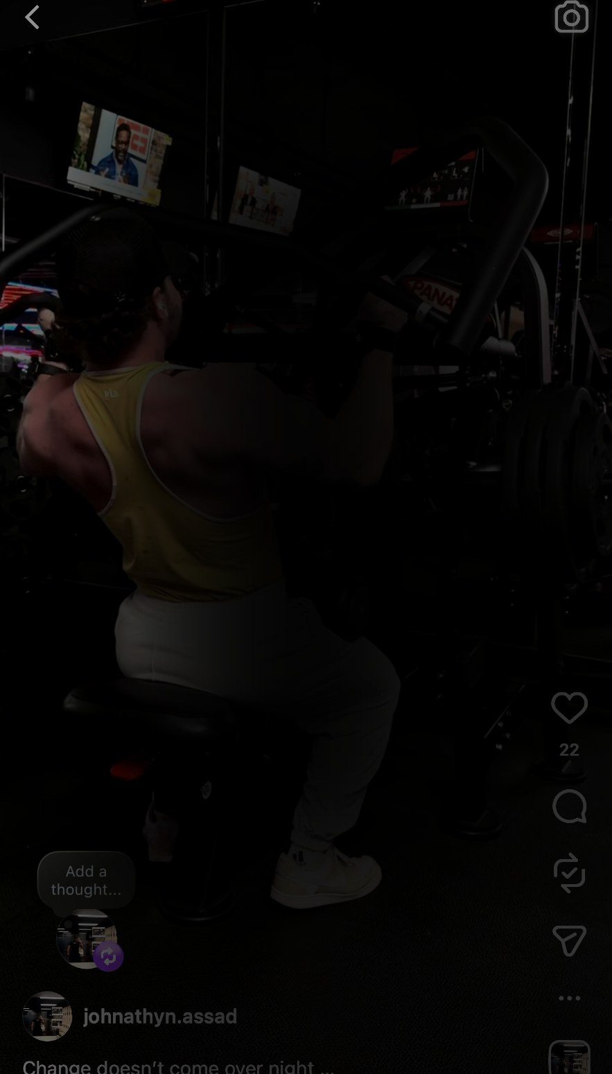 Athlete training in a dark gym